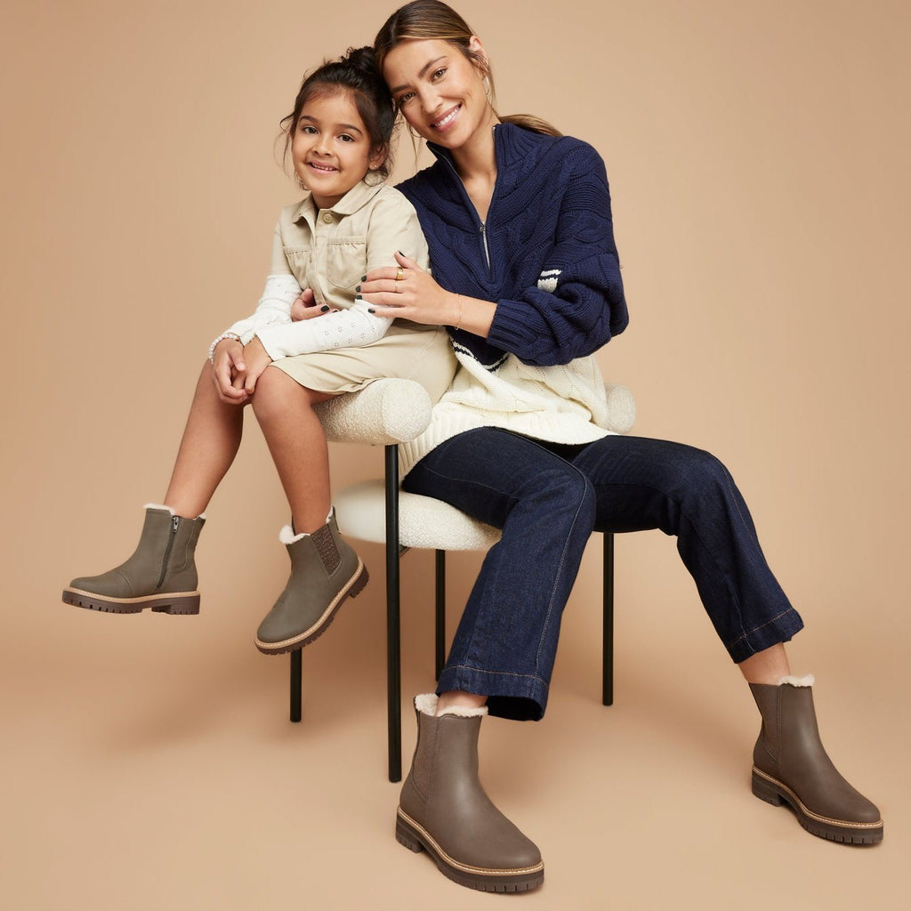 bennet boot in water resistant olive leather on model with school age child wearing matching shoe