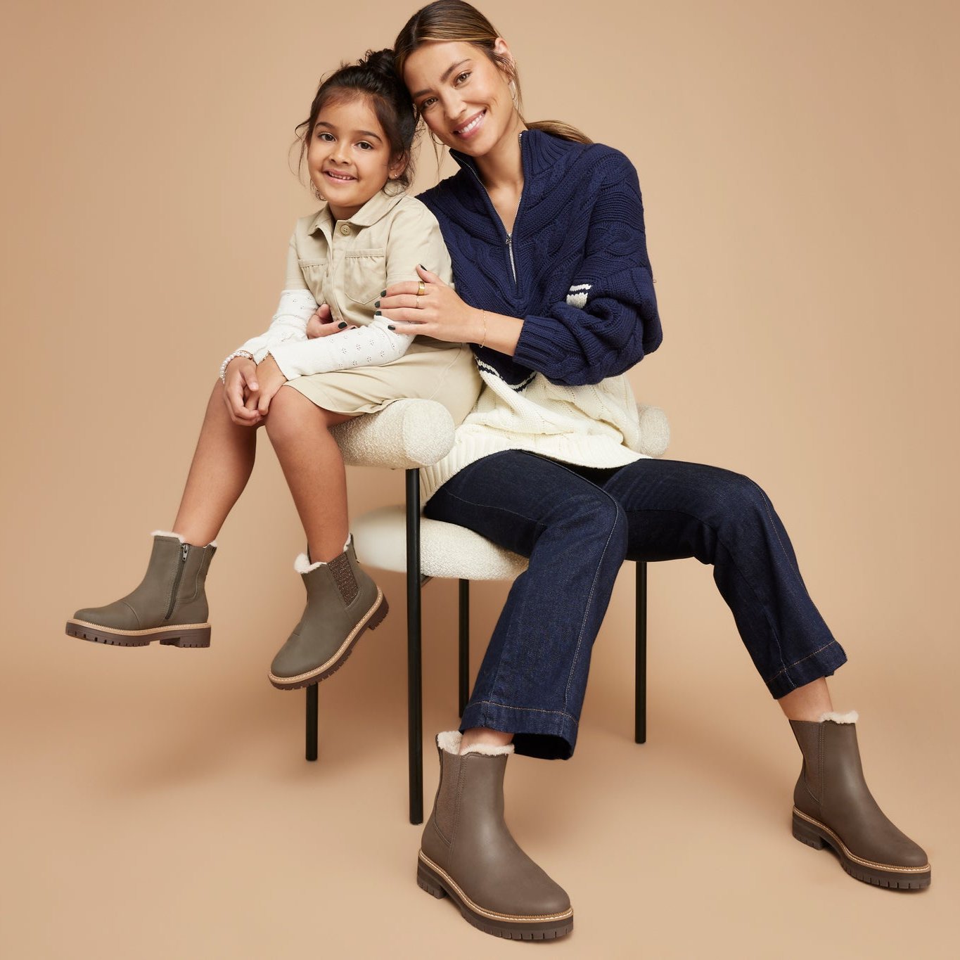 bennet boot in water resistant olive leather on model with school age child wearing matching shoe