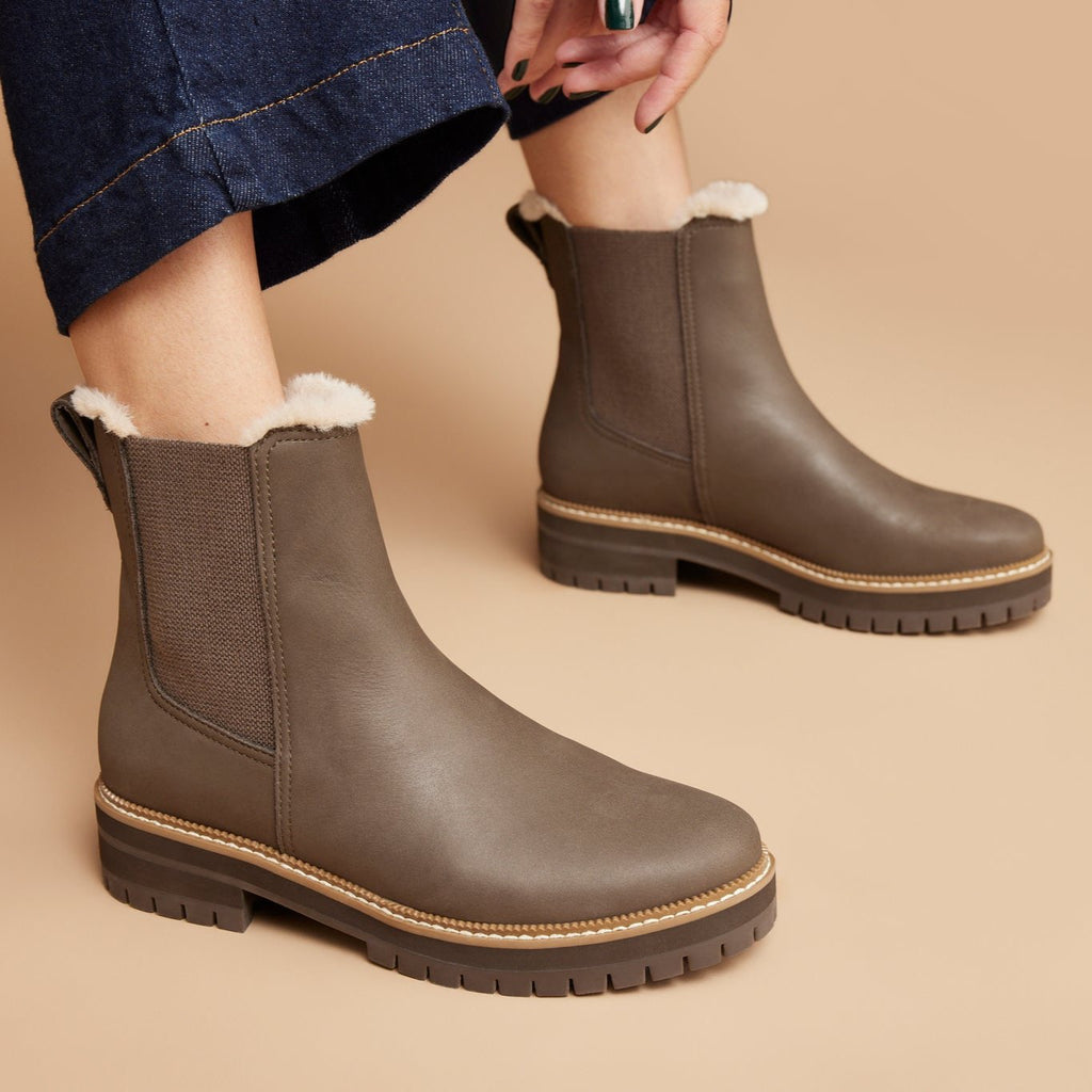 benett chelsea lug boot in olive green with faux fur lining up close detail shot