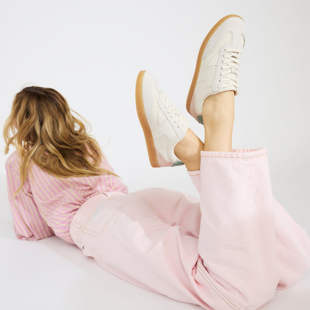 On figure image of the Collins Egret leather sneakers