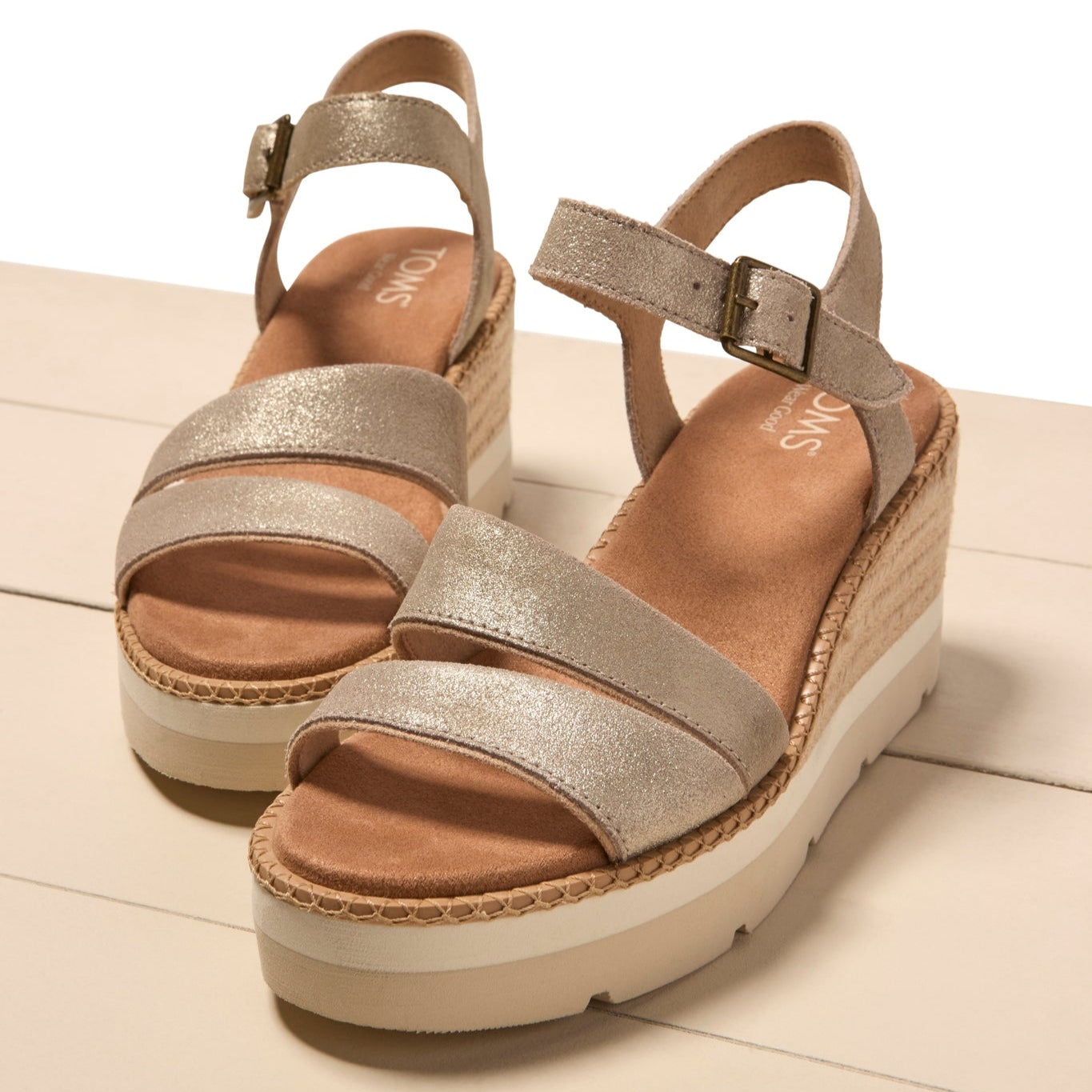 Laydown image of the champagne metallic suede Darya Espadrille Wedge