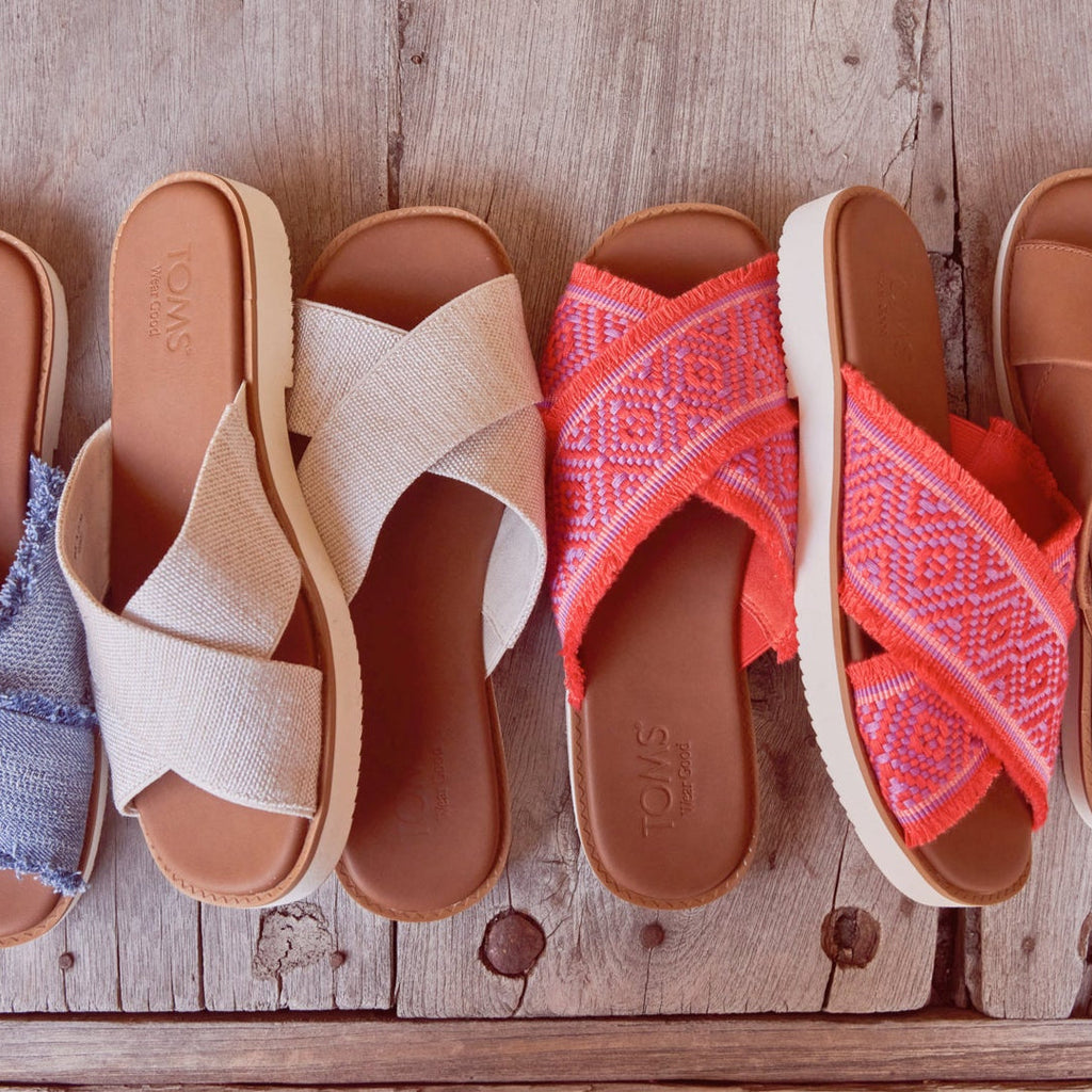 Laydown image of the natural yarn dye Mae Crossover Sandals