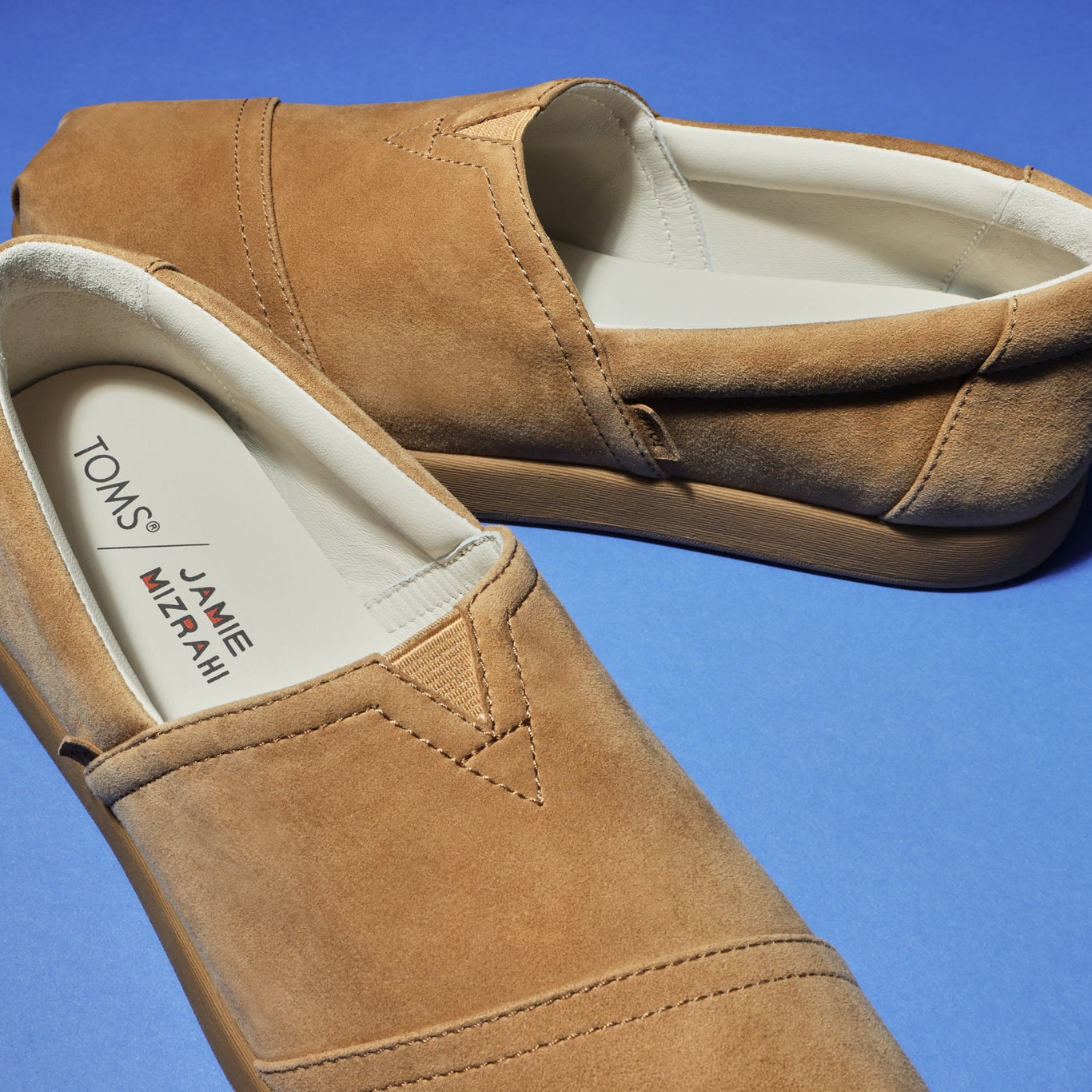 Laydown image of the amber suede Jamie Mizahi Alp FWD