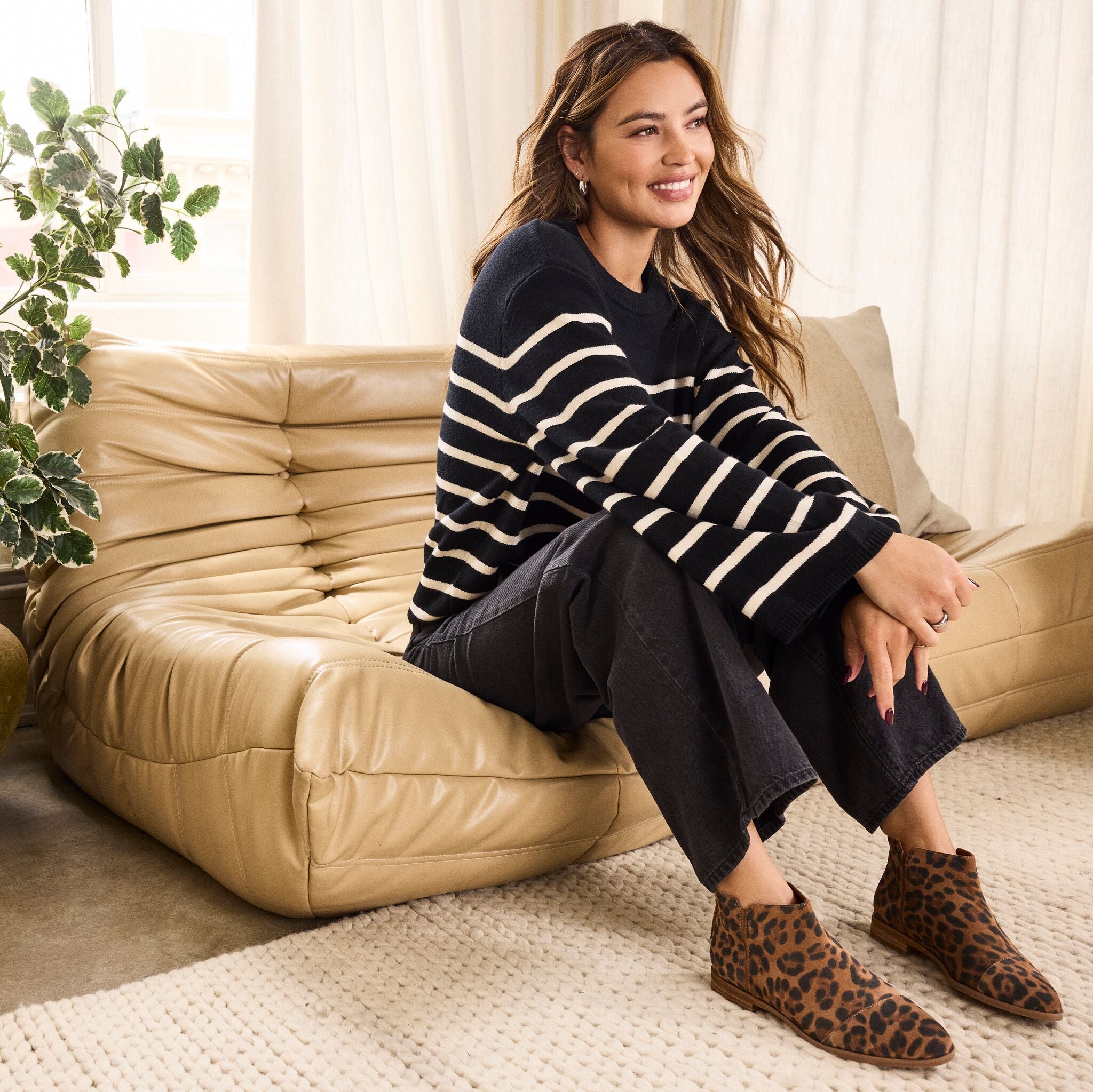 On figure image of the brown sugar leopard Rylie ankle bootie